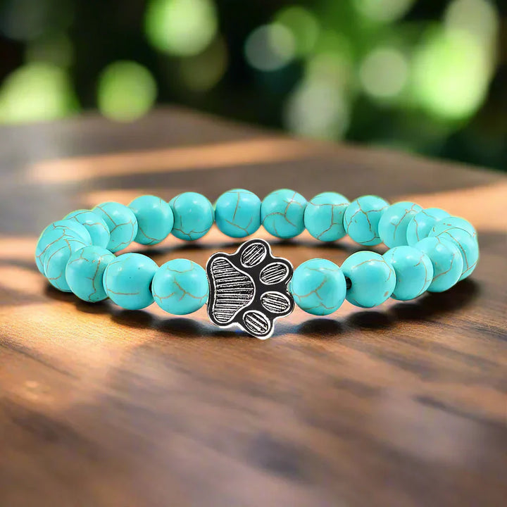 Armband mit Pfotenabdrücken, verziert mit Perlen