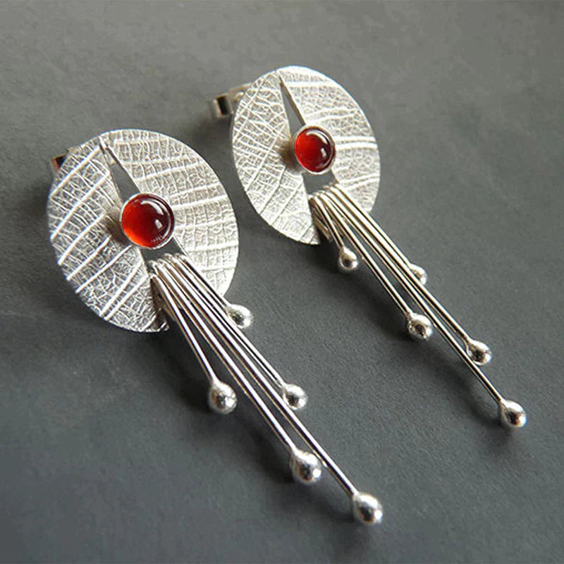 Boucles d'oreilles élégantes et exquises en pierre rouge