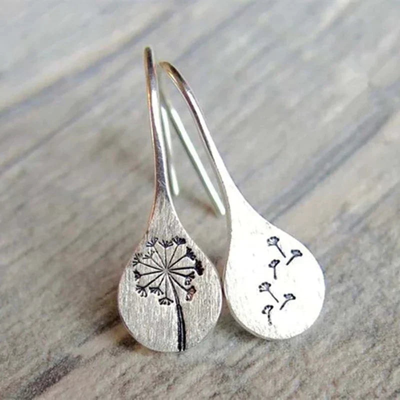 Boucles d'oreilles exclusives en argent avec feuilles de dent de lion