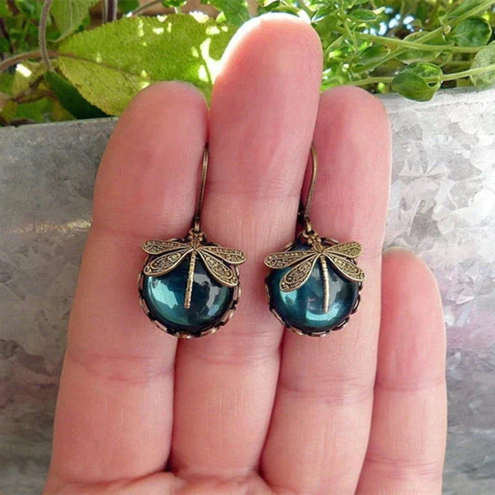 Boucles d'oreilles en or antique avec libellule