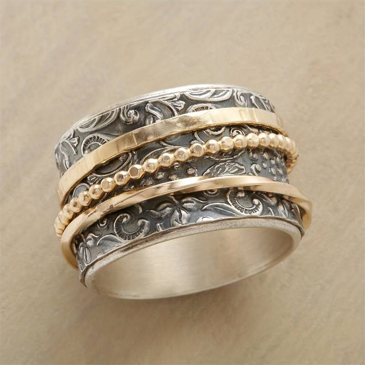 Anneau antique élégant en or et argent pour un look intemporel